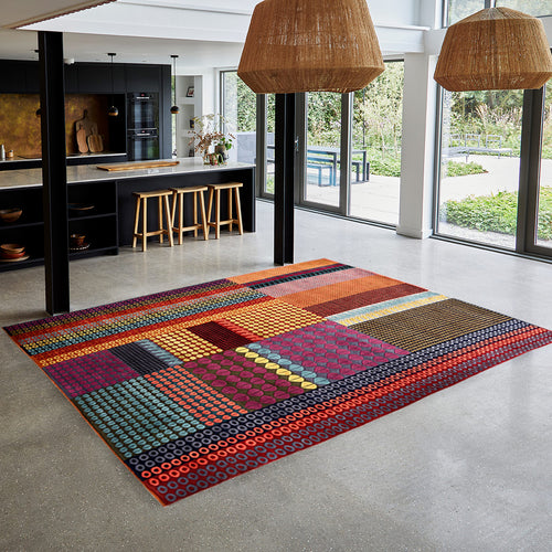 geometric rug, autumnal coloured rug, autumnal rug, dotted rug, orange dotted rug, modern rug, designer rug, red rug, luxury rug