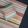 Interior accessories, interior decoration, British weaving, Margo Selby fabric, patterned fabric, colourful fabric, designer fabric, green fabric, orange fabric, white fabric